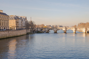 Obraz premium Paris, view of the Seine, old houses on the île de la Cité, pont Neuf in background