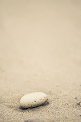 Fototapeta na wymiar Stone on a beach