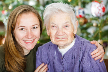 Elderly woman and young carer