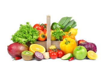 Fototapeta na wymiar Fresh vegetables and fruits in basket on white background