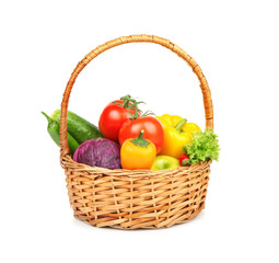 Fresh vegetables and fruit  in basket on white background