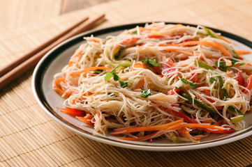 Asian salad with rice noodles and vegetables.