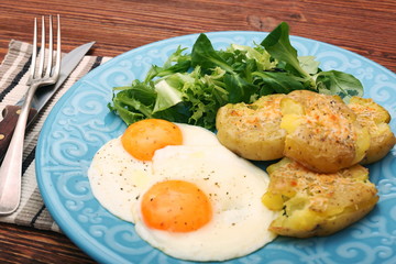Crispy smashed potatoes breakfast. Healthy lifestyle concept.