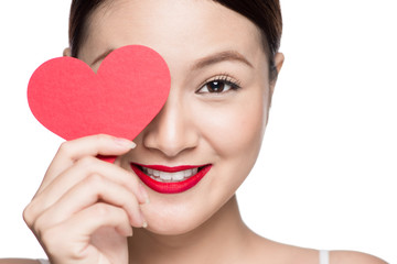 Cute attractive young woman with red heart. Valentine's day art