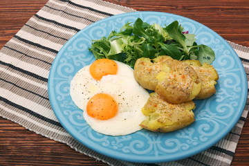 Crispy smashed potatoes breakfast. Healthy lifestyle concept.