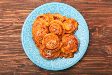 Puff pastry rolls with ham and cheese. Food for parties. Snack.