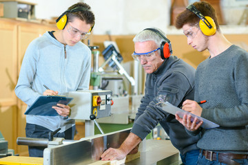 Male students in a woodwork class