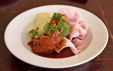 Chinese food on a plate ready to eat.