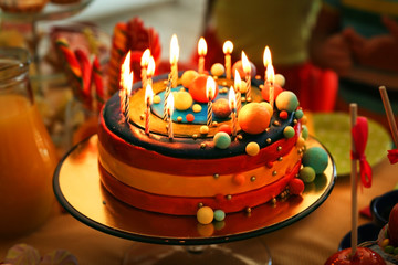 Tasty cake with candles at birthday party