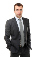 Confident handsome businessman on white background