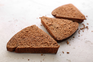 Slices of bread on light textured background