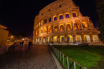 Naklejka na ściany i meble Night view of Colosseum in Rome, Italy