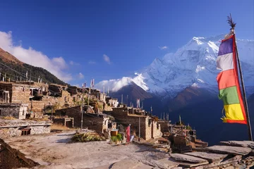 Peel and stick wall murals Nepal Traditional nepalese village on Pisang region with buddhist praying flags and North Face of Annapurna II mountain summit on background, Annapurna Circuit Trek, Himalaya, Nepal, Asia. horizontal view