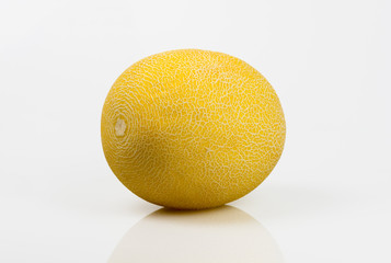 Yellow melon on white background