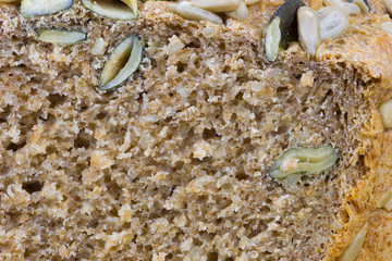 Fresh wholemeal bread made of spelled, sunflower seeds and pumpkin seeds

