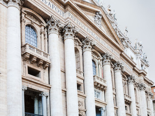 facade of Papal Basilica of St Peter in twilight