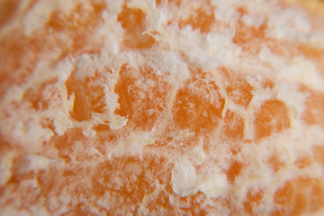 macro texture of peeled mandarin/citrus background