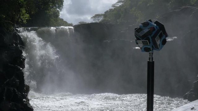 MAURITIUS - JUNE 17, 2016: Shooting 360 degrees video of nature with waterfall cameras fixed on tripod