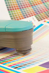 Spectrometer used for proofing on a leaf of the test print