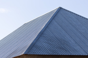Fototapeta na wymiar metal roof of the house