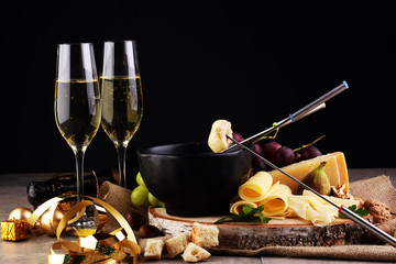 Cheese platter with different cheese and grapes 