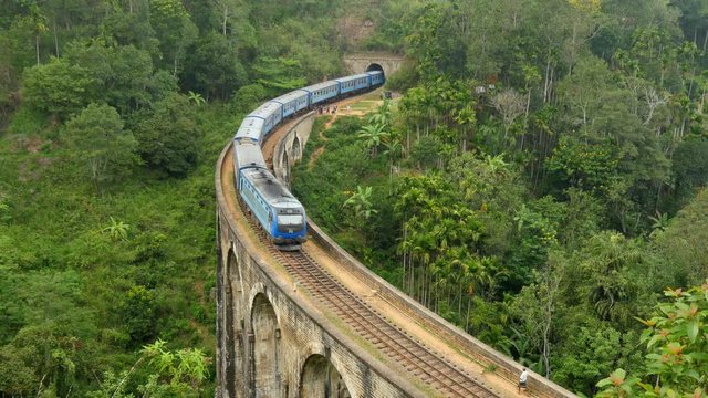 Train passing by old 9 arch bridge. Ella, Sri Lanka
