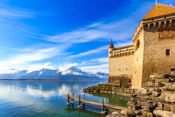 Castle by a lake front on a blue day