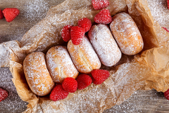 Fresh Raspberry Jam Doughnuts In Icing Sugar