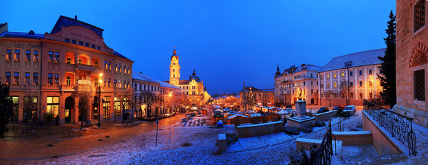 Fototapeta na wymiar Advent christmas market at night in Pecs, Hungary