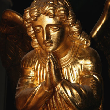 Figure of a praying angel