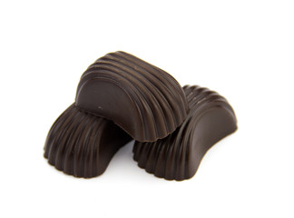 Chocolate candies isolated on white background.