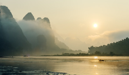 Misty morning on the river at sunrise - The Li River, Xingping
