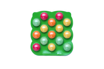 Colorful Pills for Kids in the plastic packaging isolated on white background.