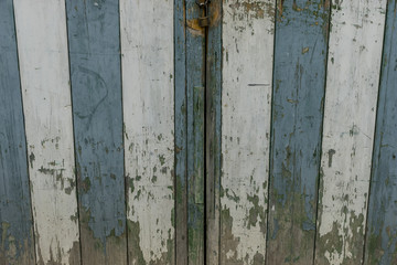 Old and worn wooden door in the town of Valldemosa in the Balear