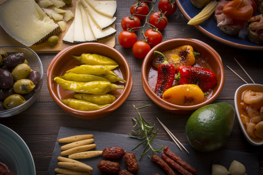 Spanish tapas starters on wooden table