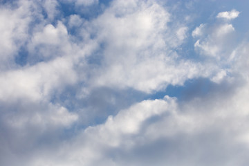 clouds in the blue sky as background