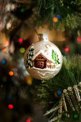 Decorated Christmas tree closeup.  New Year baubles macro photo with bokeh.