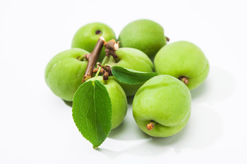 Green plum korean fruits with leaves