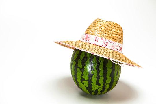 Watermelon With Straw Hat Isolated On A White