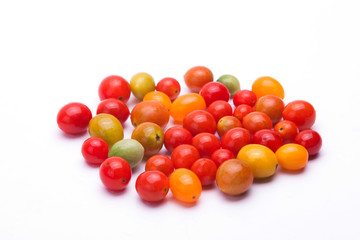 Obraz premium A group of Fresh korean cherry tomatoes on a white.