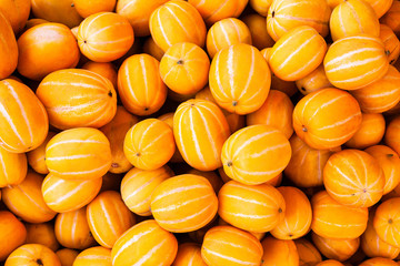 Yellow Korean melon in a bulk for background in korea