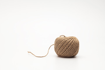 Ball of wool yarn on white background
