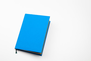 Book with Blue color Hardcovered isolated on white backtround 