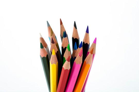Bunch of colored pencils on white background