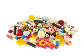 Mixed colorful candy on white background
