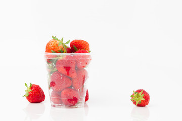 Strawberries on plastic cup