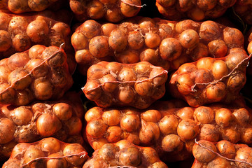 Background of onions on the pick up truck 