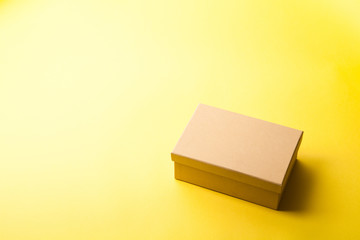 Brown box on yellow background