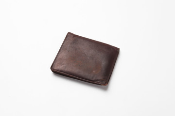 Brown old leather wallet isolated