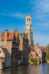 Fototapeta premium View from the Rozenhoedkaai in Brugge with the Perez de Malvenda house and Belfort van Brugge